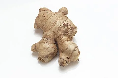 Fresh Ginger Root close up macro on white background Stock Photos