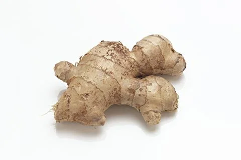 Fresh Ginger Root close up macro on white background Stock Photos