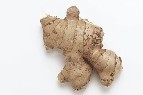 Fresh Ginger Root close up macro on white background Stock Photos