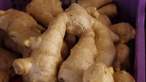 Fresh Ginger Root on Display at a Traditional Italian Produce Market Stock Footage 335695038