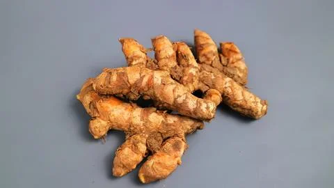 Fresh ginger root on gray background Stock Photos