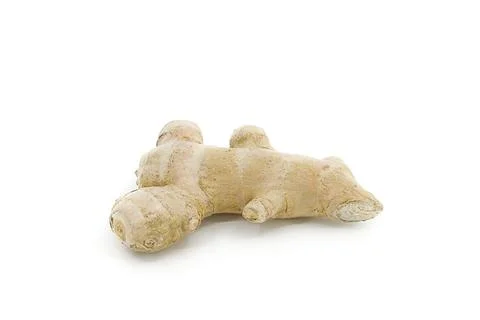 Fresh ginger root highlighted on plain white background. Stock Photos