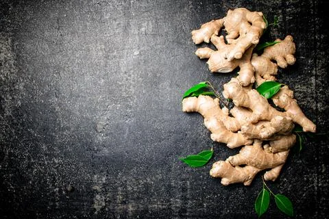 Fresh ginger root with leaves. Stock Photos