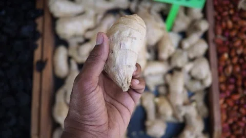 Fresh ginger root for sale at local market stall Stock Footage 314691587