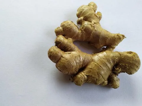 Fresh ginger root on white background. Stock Photos