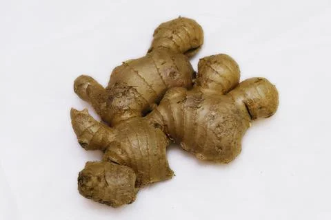 Fresh ginger root on a white background Stock Photos