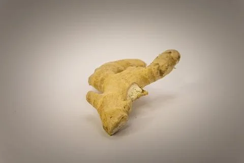 Fresh ginger root on a white background. Stock Photos