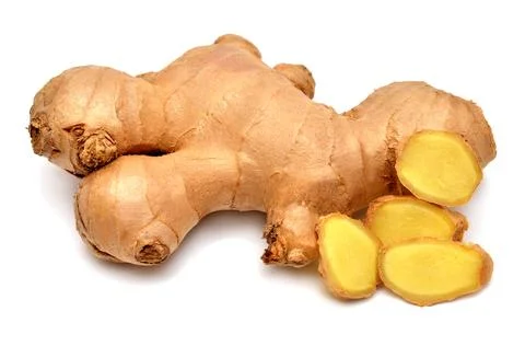 Fresh ginger root whole and slice isolated on white background. Creative me.. Stock Photos