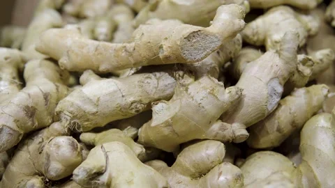 Fresh Ginger Roots in a Black Crate at Market Highlighting Natural Root Video stock 325645134