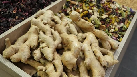 Fresh ginger roots, fresh ginger tubers for healing, at the spice shop Stock Footage 276226479