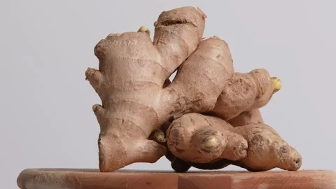Fresh Ginger rotating on a table Stock Footage 249949622