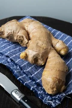 Fresh ginger on rustic background Stock Photos