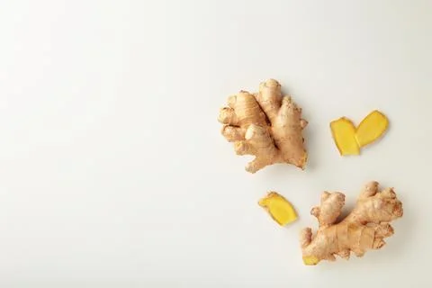 Fresh ginger with sliced on white background Stock Photos