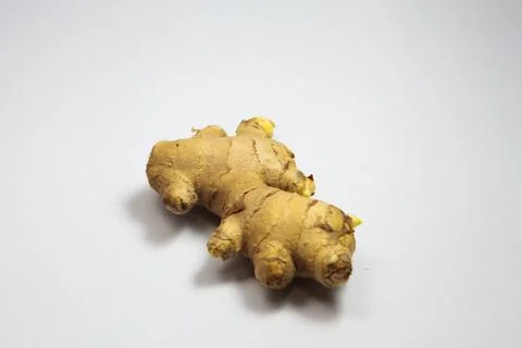 Fresh ginger on a white background Stock Photos