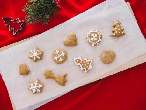 Fresh gingerbread cookies in kitchen table with powder,anise,cinnamon Stock Photos
