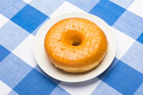 Fresh glazed donut Stock Photos