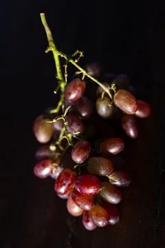 Fresh Grape Bunch On Table Stock Photos
