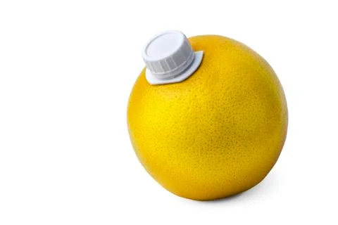 Fresh grapefruit with a plastic lid like a packaged juice. concept of fresh f 写真素材