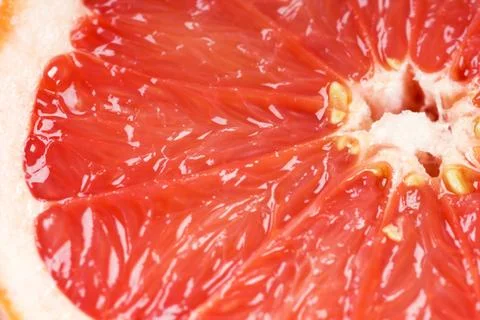 Fresh grapefruit slice closeup Stock Photos