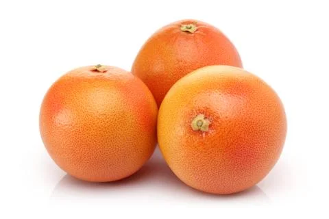Fresh grapefruits on white background Stock Photos