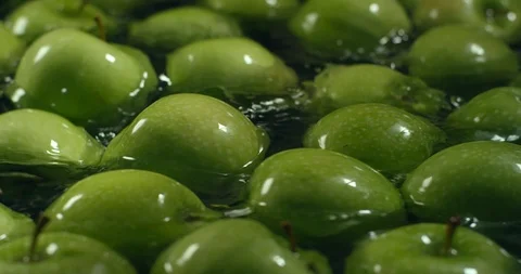 Fresh Green Apples being washed by water. Washing Fruits. Stock Footage 97435015