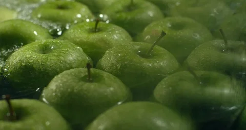 Fresh Green Apples being washed by water. Washing Fruits. Video stock 97435494