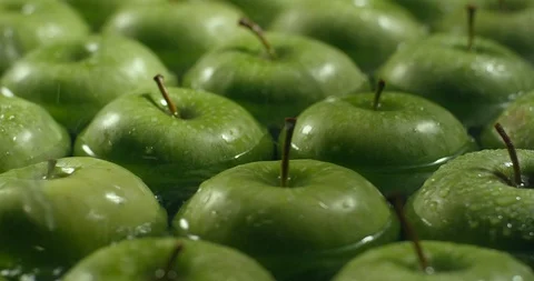 Fresh Green Apples being washed by water. Washing Fruits. Stock Footage 97436295