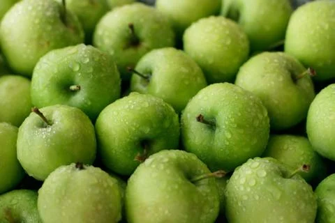 Fresh green apples full frame use as background Stock Photos