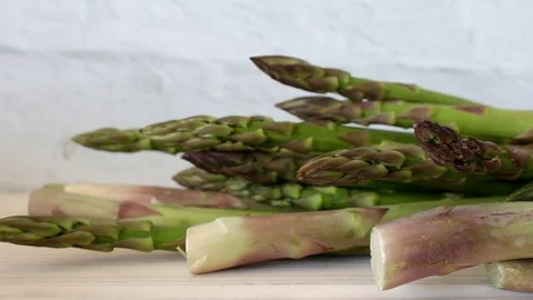 Fresh green asparagus lying Stock Footage 75746566