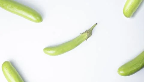 Fresh Green Eggplants Corner Frame on White Background Stock Photos