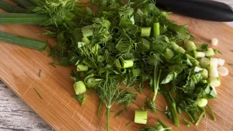 Fresh Green Herbs on Cutting Board 動画素材 340340862