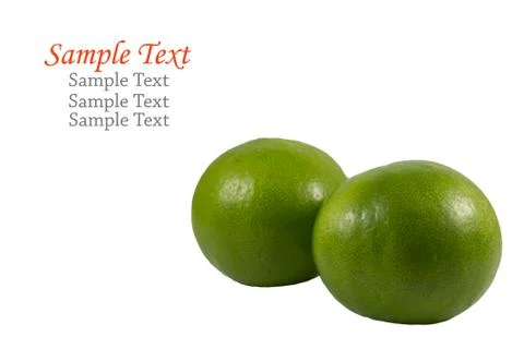Fresh green lemons on white background . Stock Photos
