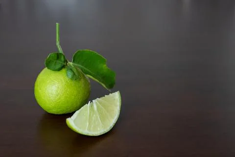 Fresh green lime slice on the table Stock Photos