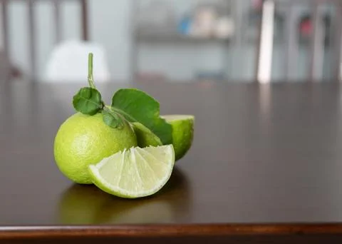 Fresh green lime slice on the table Stock Photos