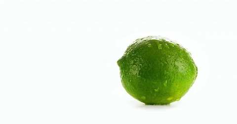 Fresh Green Lime on white background 4K video Stock Footage 83465676