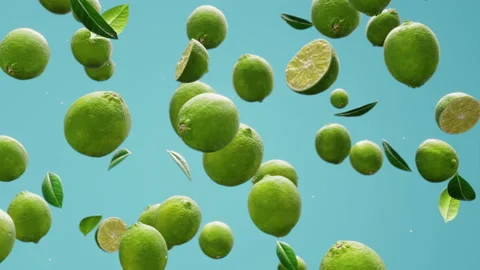 Fresh green limes falling down endless loop backdrop slow-motion Stock Footage 150152389