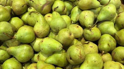 Fresh Green Pears Piled High in Grocery Store Stock Footage 332556457