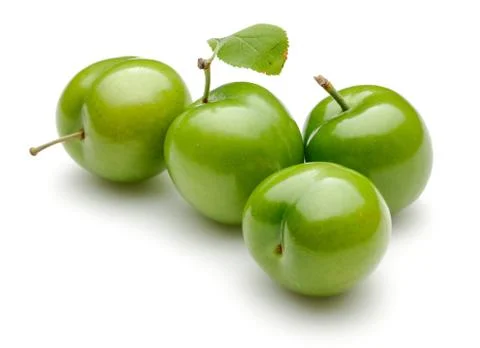 Fresh green plums with leaf Stock Photos