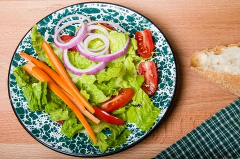 Fresh green salad with bread Stock Photos