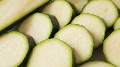 Fresh green sliced zucchini vegetable Stock Footage 337012358