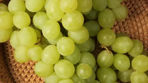 Fresh green table grapes rotating in a basket Stock-Footage 341281027