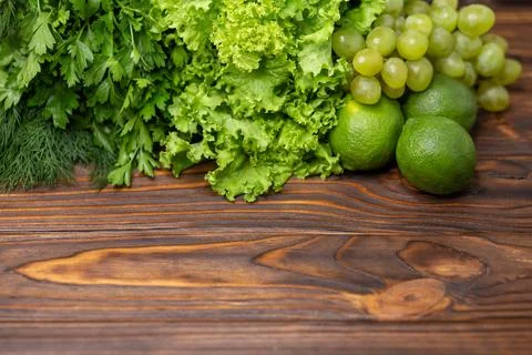 Fresh green vegetables and fruits. Fresh vegetables with space for text. Stock Photos