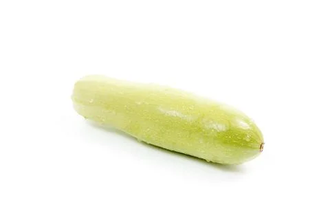 Fresh green zucchini on white background. Stock Photos