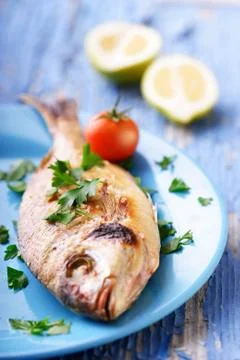 Fresh grilled fish Stock Photos
