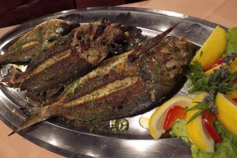 Fresh grilled fish Stock Photos