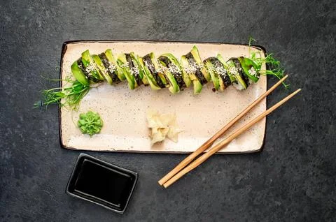 Fresh grilled zucchini slices on a rectangular plate Stock Photos