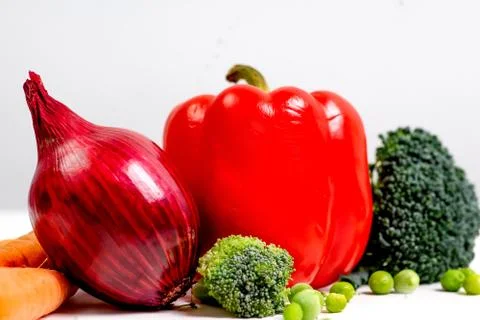 A fresh group of vegetables on white background Stock Photos