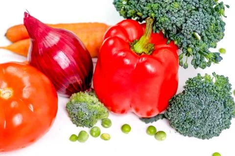 A fresh group of vegetables on white background Stock Photos