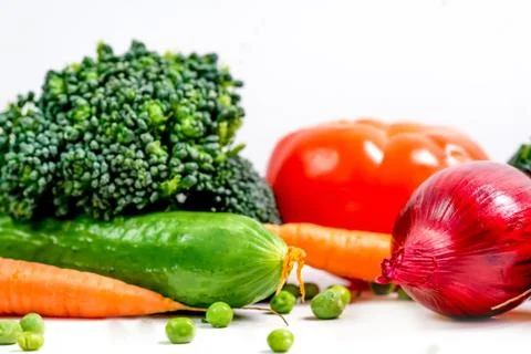 A fresh group of vegetables on white background Stock Photos