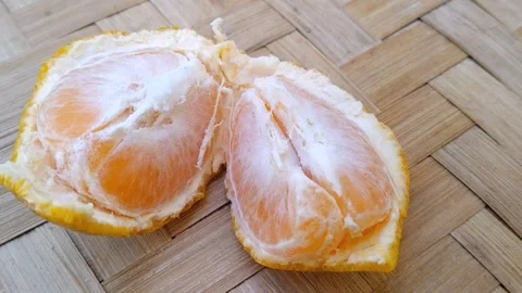 Fresh Halved Oranges on Bamboo Mat Background Macro Shot Stock Footage 340461862